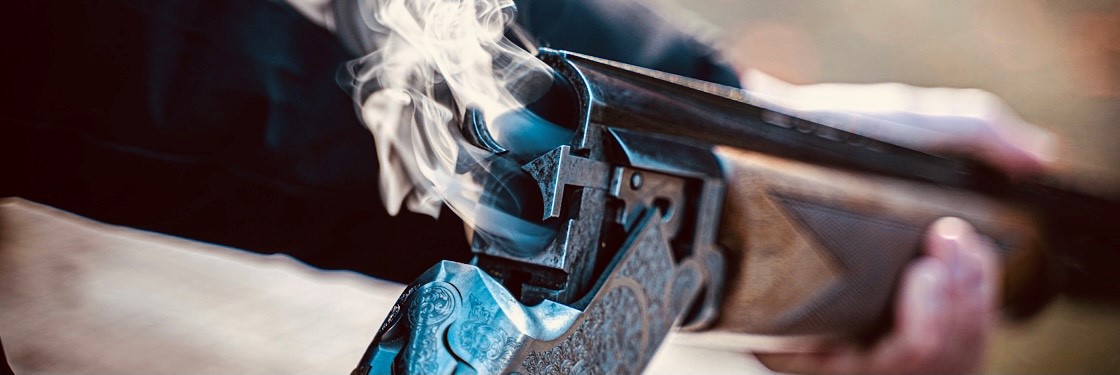 Closeup of a smoking shotgun